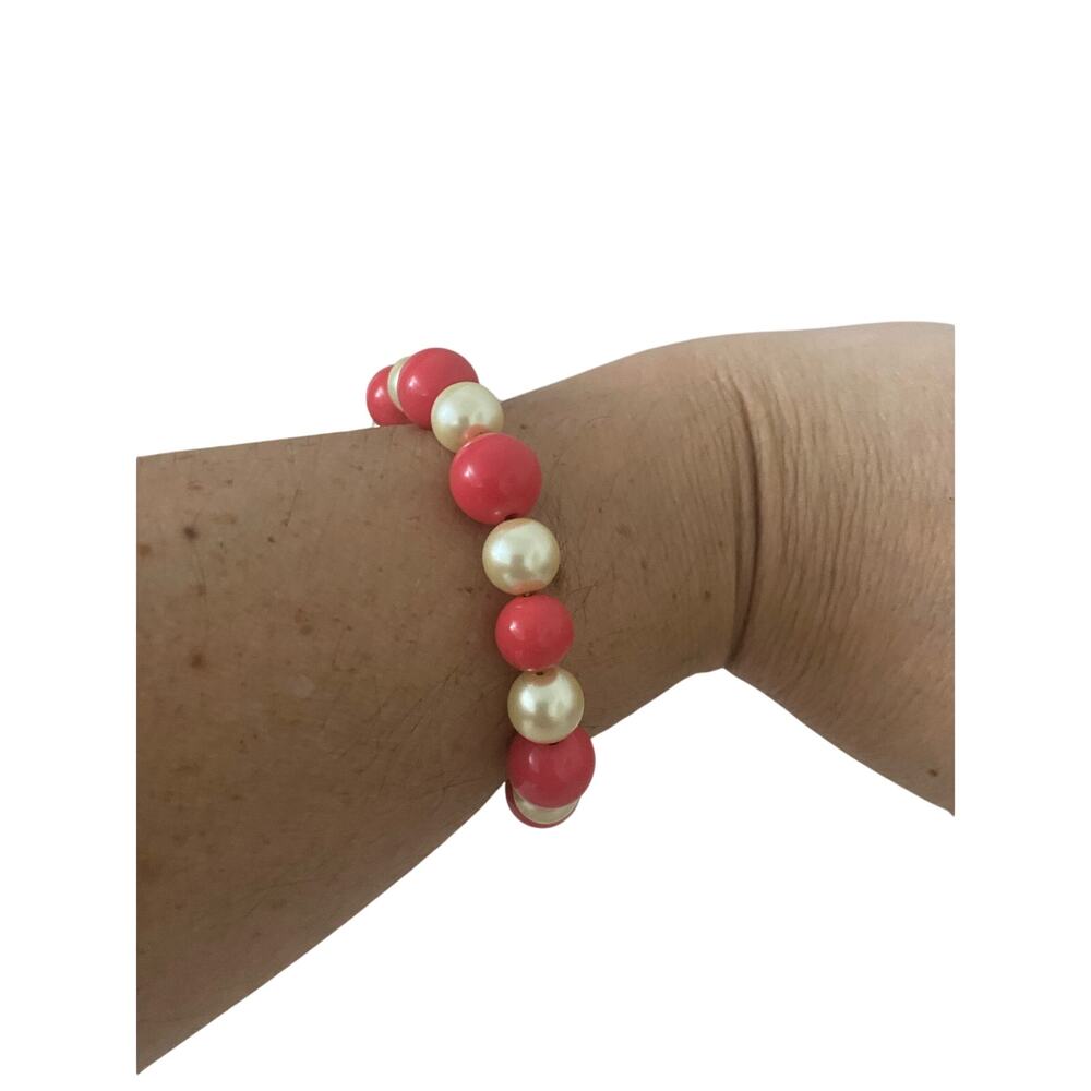 Bright pink and faux pearl bracelet